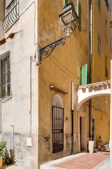 Between The Roofs Of Old Town And The Sea